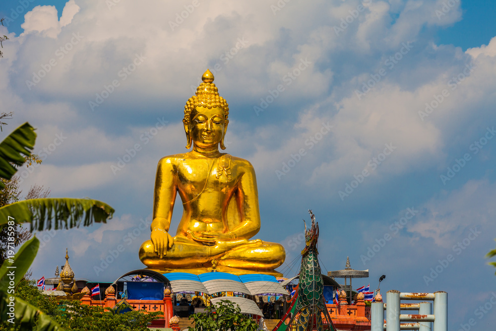 sitting golden big Buddha statue at Golden Triangle at view point of Kong river in Chiang Rai Thailand sitting golden big Buddha statue at Golden Triangle at view point of Kong river in Chiang Rai Thailand