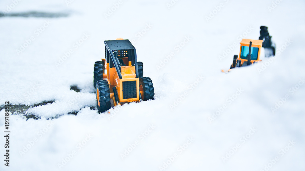 Two forklings standing side by side and a snowy winter. Two forklings standing side by side and a snowy winter.