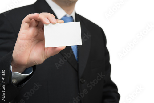 Man's hand showing business card - closeup shot on white background