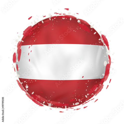 Round grunge flag of Austria with splashes in flag color.