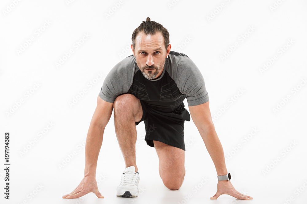 Portrait of a concentrated mature sportsman Portrait of a concentrated mature sportsman