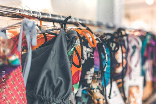 Women swimsuits in the retail store on Bali island, Indonesia. Fashion shopping concept in Asia.