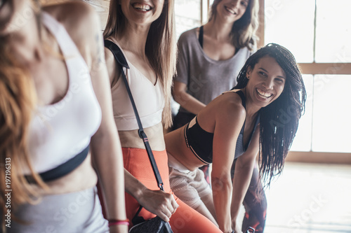 Women laughing in fitness studio