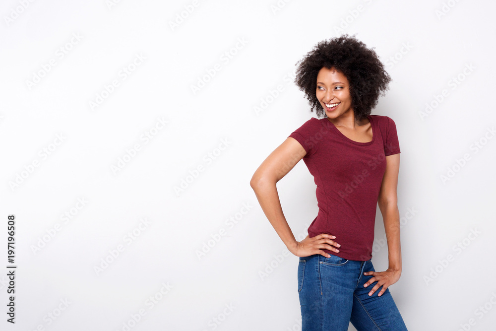 stylish female fashion model posing against white background and looking away stylish female fashion model posing against white background and looking away