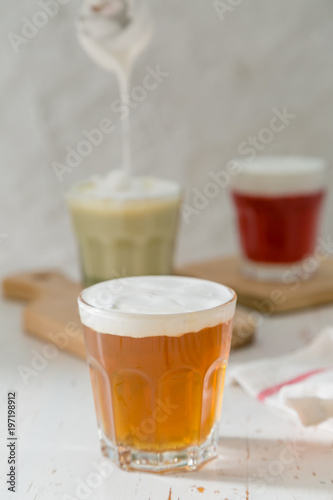 Taiwanese food trend - cheese tea assortment on white wood background
