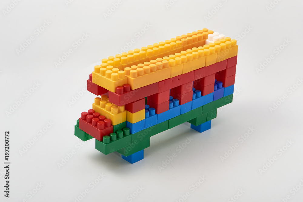 bus, minibus from colored cubes designer on white background.