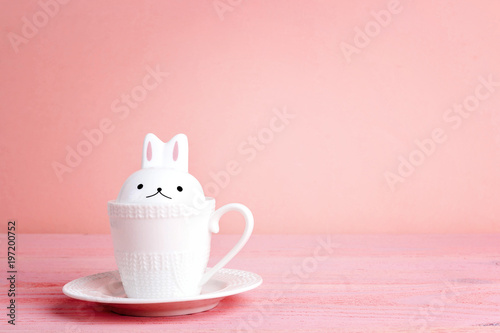 Easter bunnny-cup  on a pink background.