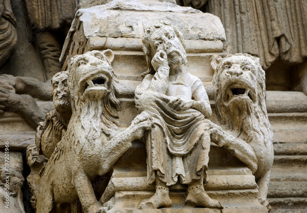 Daniel in the lions' den. Architectural detail. Facade of the church of St. Trophime in Arles. Provence, France. 