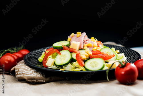 Delicious fresh salad and olive oil