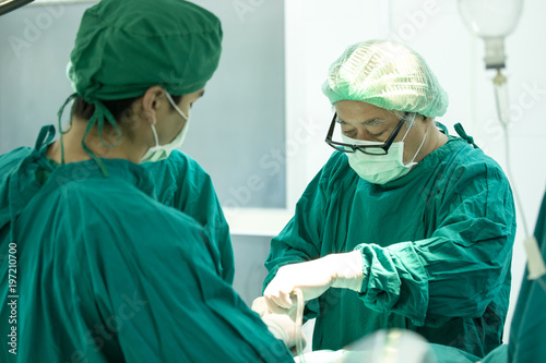The surgery team working together at the operating room in the hospital.