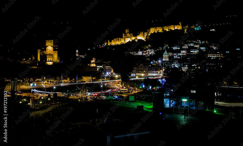 Tbilisi, Georgia - June 15, 2017: A panoramic night view of Georgian capital with lots of lights 