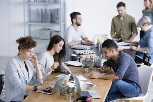 Coworkers brainstorming ideas for project photo