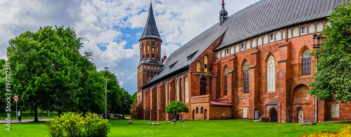 Panorama with a view of the famous Cathedral surrounded by lush summer greenery. photo