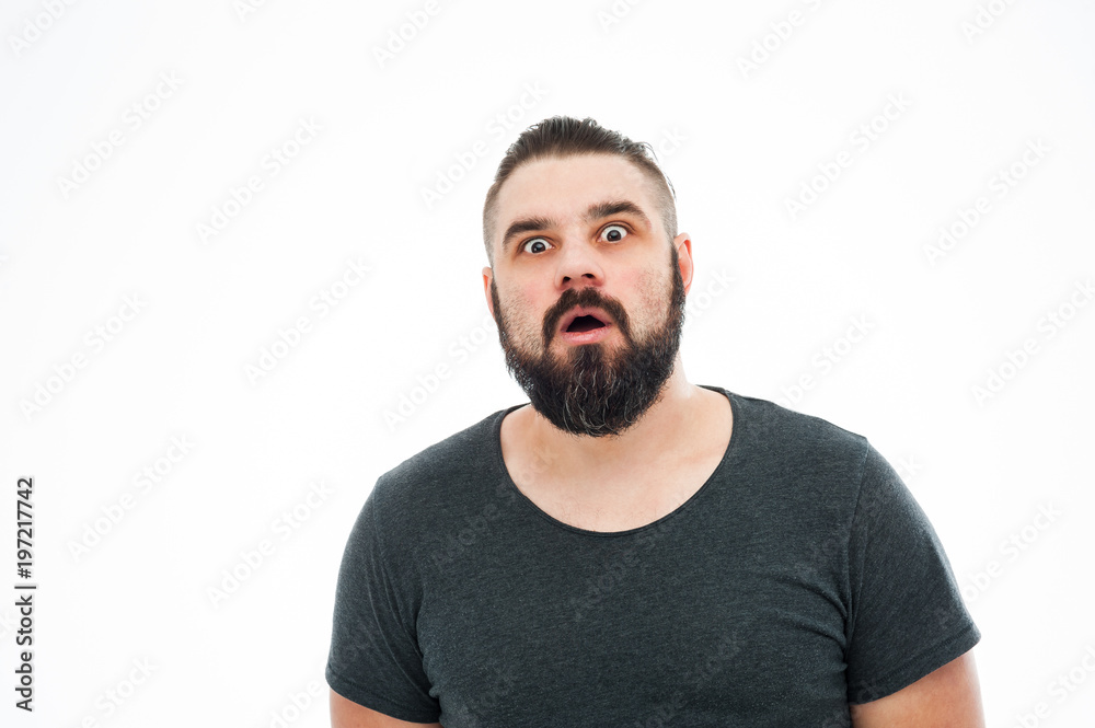 Man with shocked, amazed expression isolated on white background