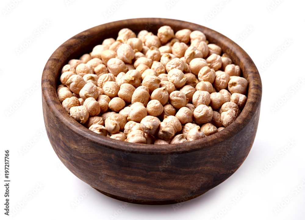 Chickpeas in wooden bowl isolated on white Chickpeas in wooden bowl isolated on white