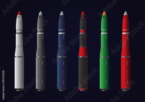 Set of various colorful missiles, or rockets, on dark background