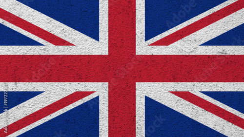 flag of the United Kingdom painted on the wall background. 