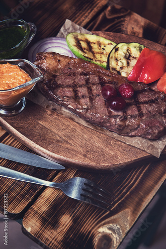 grilled beef steak with sau...
