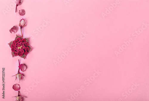 Festive flower composition on pink background. Overhead view