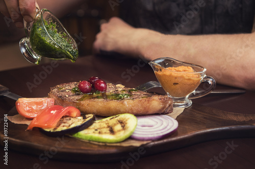 grilled beef steak with sau...