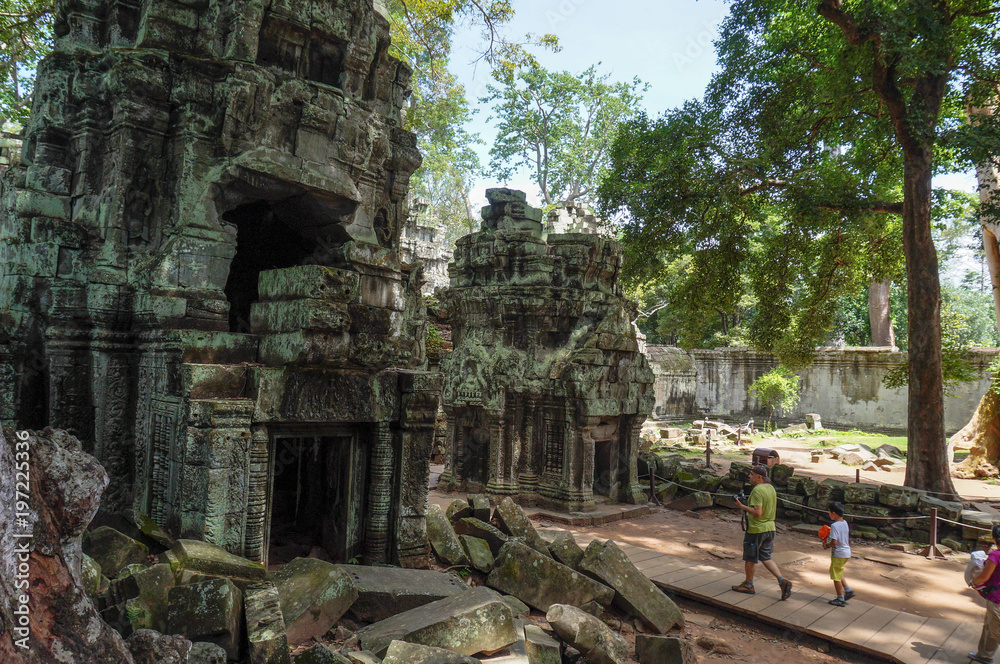 Siem Reap, Cambodia - August 5th, 2016:Ta Prohm, part of Khmer temple complex, Asia. Siem Reap, Cambodia. Ancient Khmer architecture in jungle.ia. Ancient Khmer architecture in jungle.