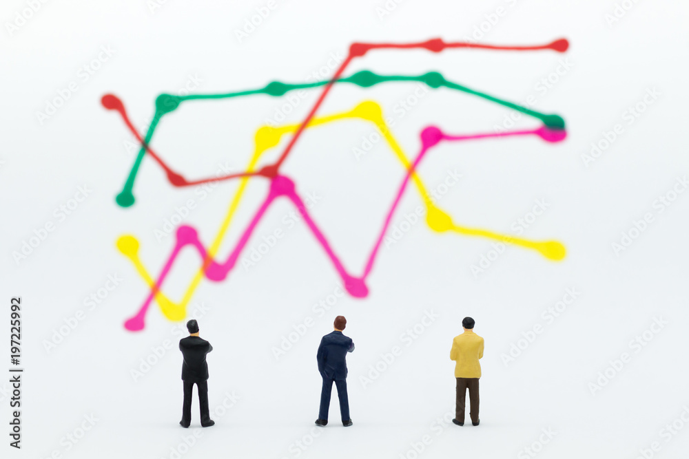 Miniature people: Businessman stand front of dashboard, display graphs, profit margins of  background. Image use for business concept.