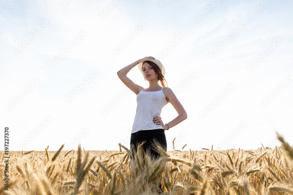 Redheaded girl in summer field Redheaded girl in summer field
