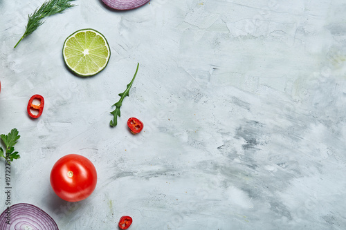 Seamless pattern with red pepper, onion, tomatoes, lime, dill on white background, top view, close-up, selective focus