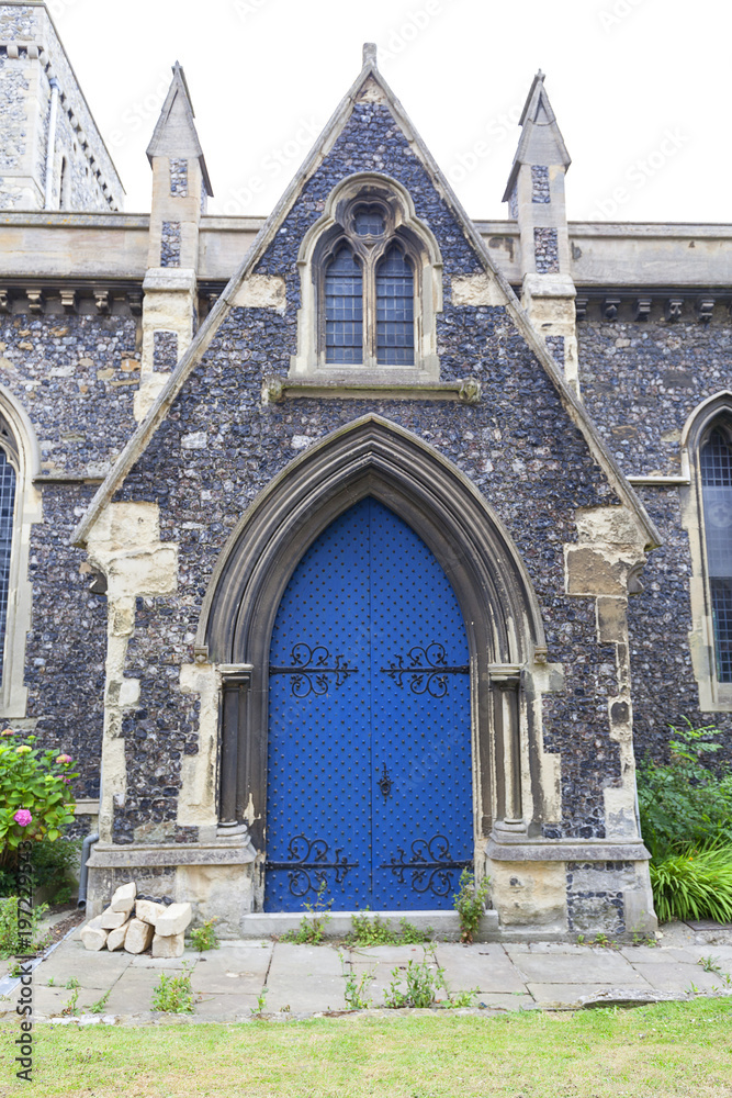 12th century Romanian style Church of St Mary the Virgin,  blue door, Dover, United Kingdom