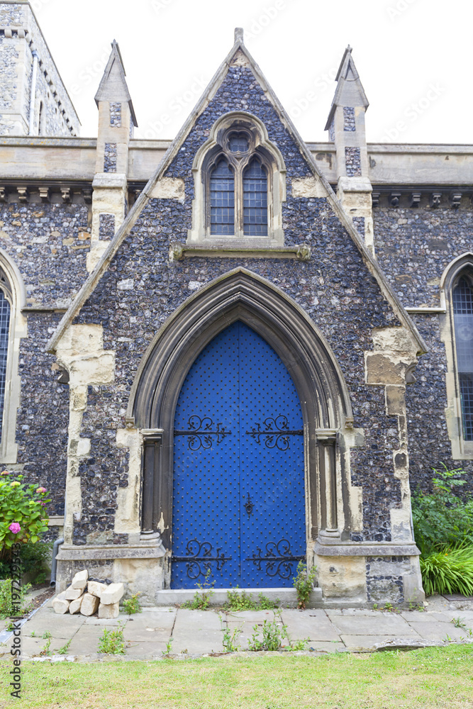12th century Romanian style Church of St Mary the Virgin, blue door, Dover, United Kingdom 12th century Romanian style Church of St Mary the Virgin, blue door, Dover, United Kingdom