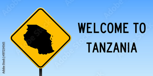 Tanzania map on road sign. Wide poster with Tanzania country map on yellow rhomb road sign. Vector illustration.