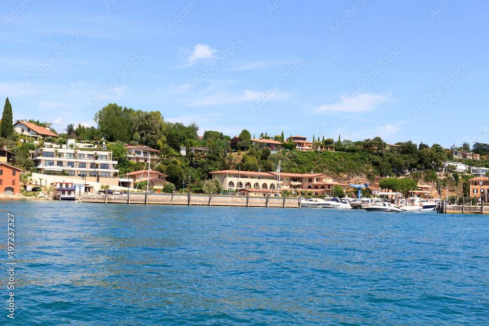 Marina at Lake Garda with houses, Italy