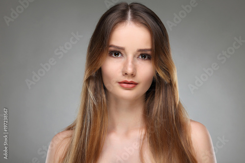 Beautiful girl, isolated on a light - grey background, emotion
