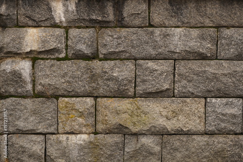 Old masonry made of large granite blocks 