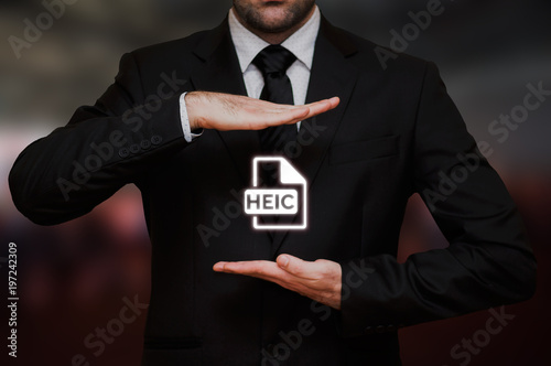 High Efficiency Image File Format (HEIC) icon with businessman on bokeh background photo