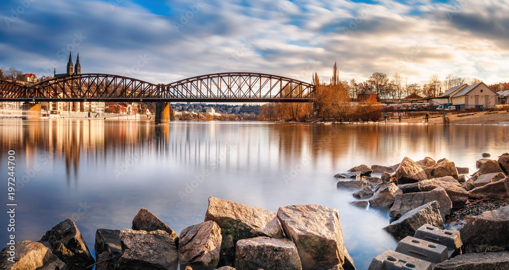 Beautiful sunset view on Vysehrad church of st Peter and Paul. Panorama of castle.