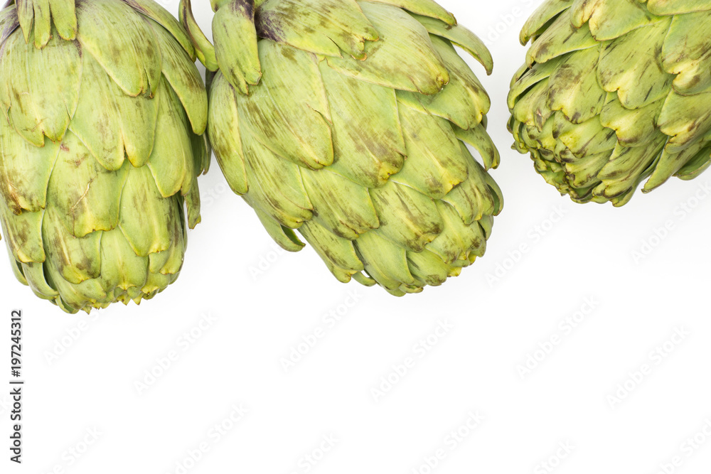 Fototapeta premium Three globe artichoke top view isolated on white background raw fresh green.