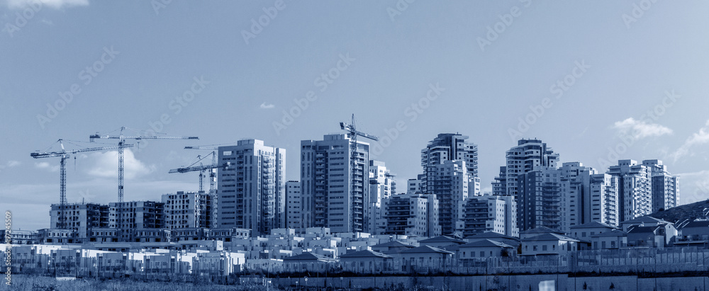 Fototapeta premium Banner - view of New Neighborhood - Concept of Modern Residential Buildings.Blue toned image