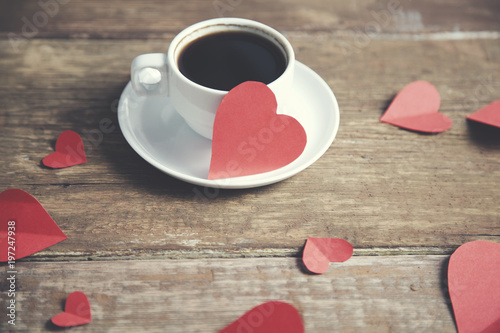  hearts and coffee on wooden table background