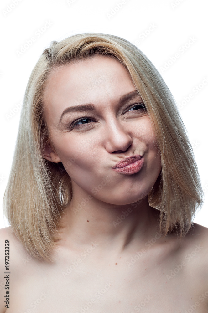 Portrait of an emotional girl on a white background. Portrait of an emotional girl on a white background.
