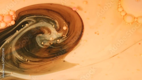 Ink Bubbles In Water. Orange Bubbles.Bright Collors Bubbles Oil Beautiful Paint Surface Red And Yellow Universe Of Color Moving Multicolored Macro.