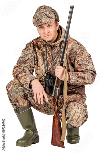 portrait of a male hunter with double barreled shotgun Isolated on white background. hunting and people concept.