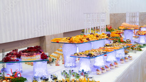 buffet: snacks and salads are on the table.