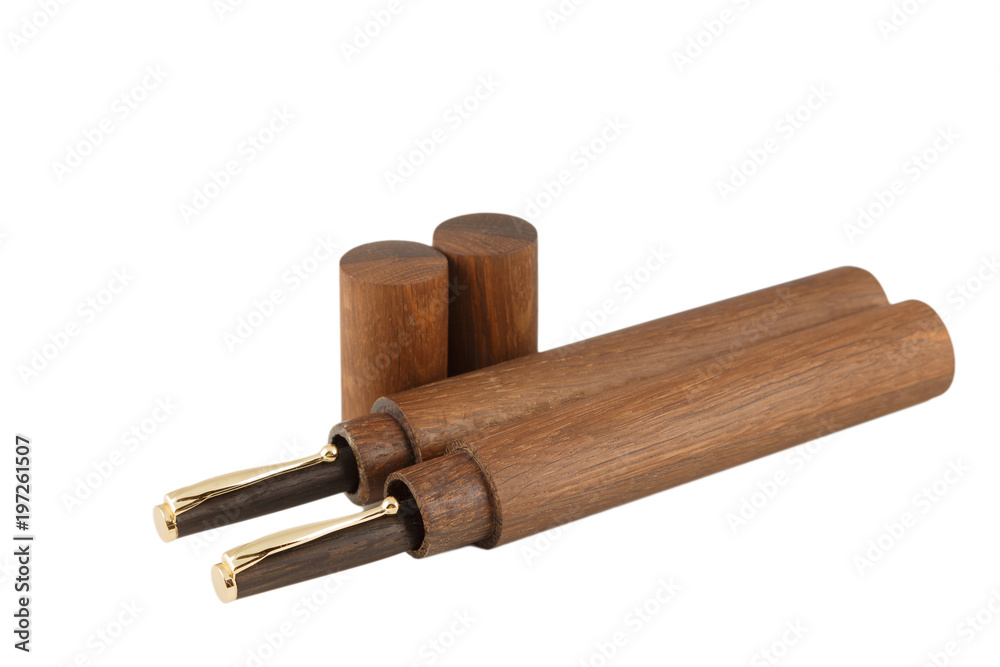Wooden ball pen with a tube for storage on a white background
