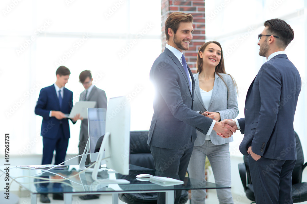 handshake business partners at a meeting handshake business partners at a meeting