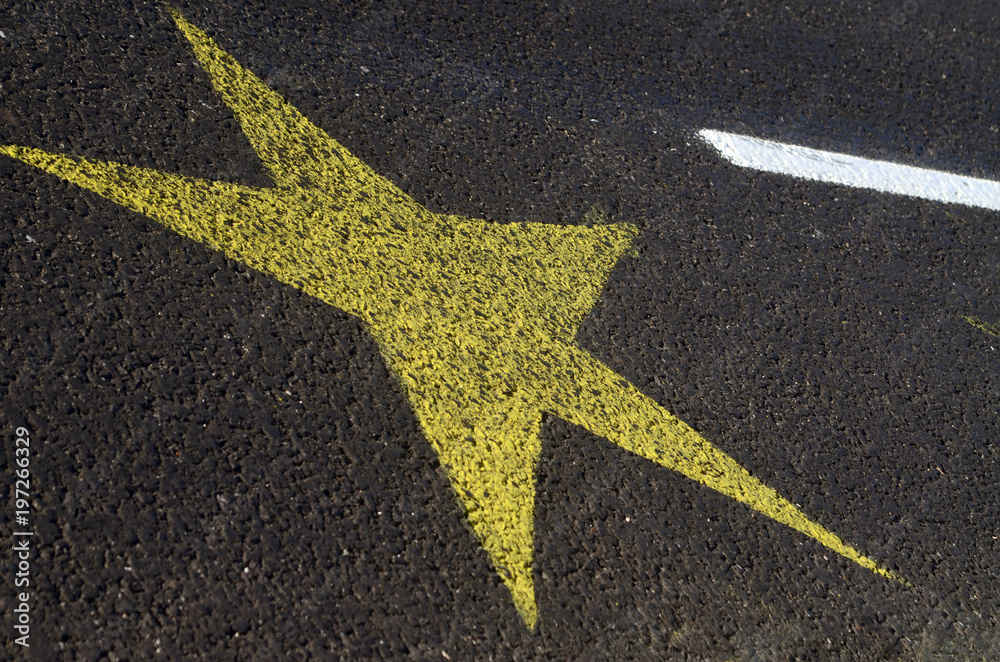 star sign  in the asphalt 