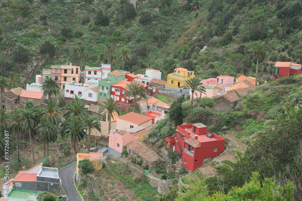 colored homes in a mountain