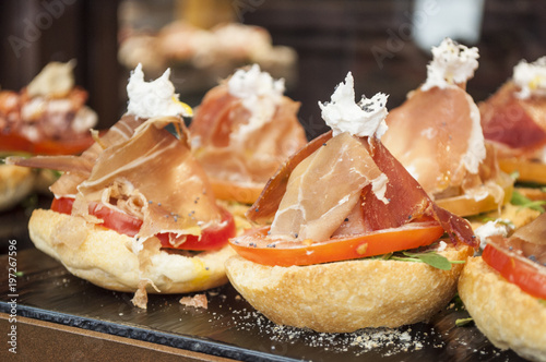ham and tomato appetizer on bread
