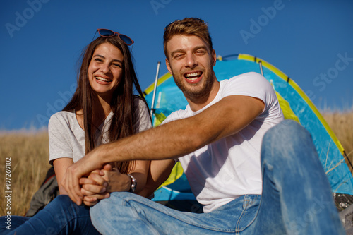 Happy young couple enjoys a sunny day in nature © djile