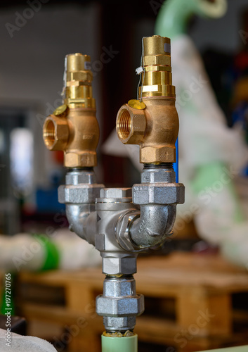 Brass valves on a pipe conjuction